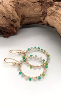 Load and play video in Gallery viewer, Glass Beaded Hoop Earring
