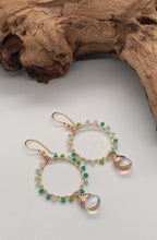 Load and play video in Gallery viewer, Glass Beaded Hoop Earring
